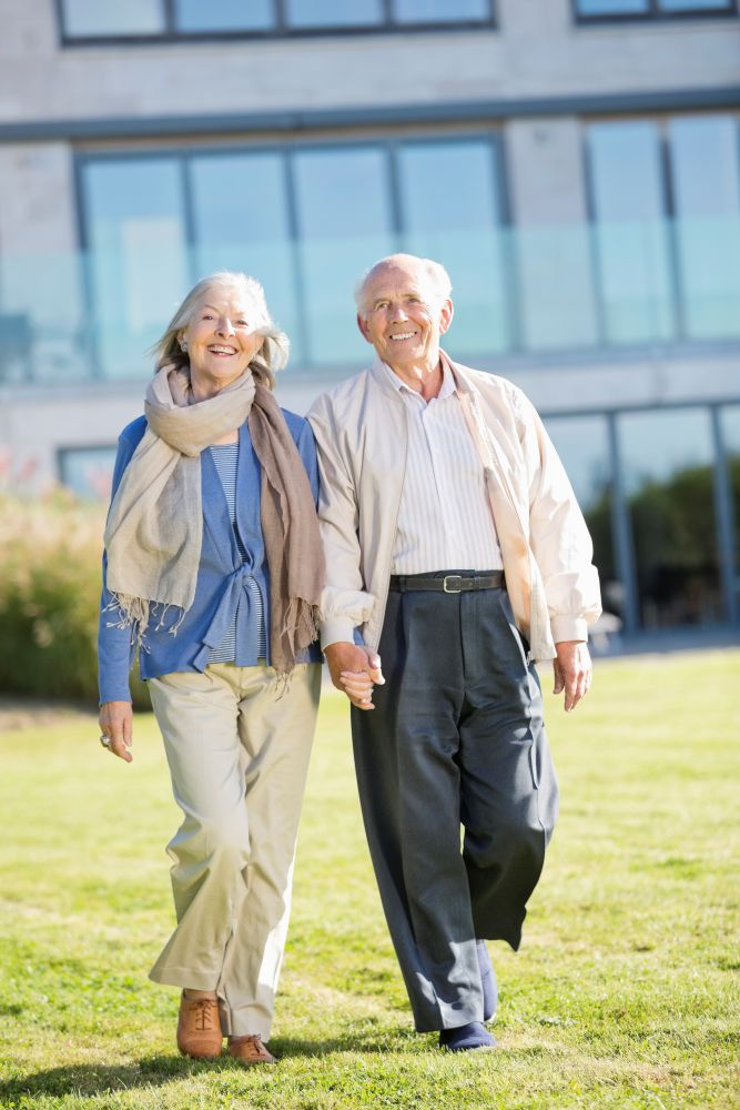 Happy seniors happy to maintain their home with a reverse mortgage loan