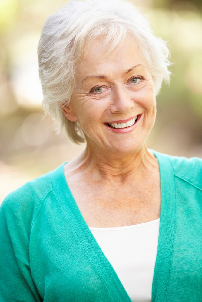 Senior lady happy in a reverse mortgage review